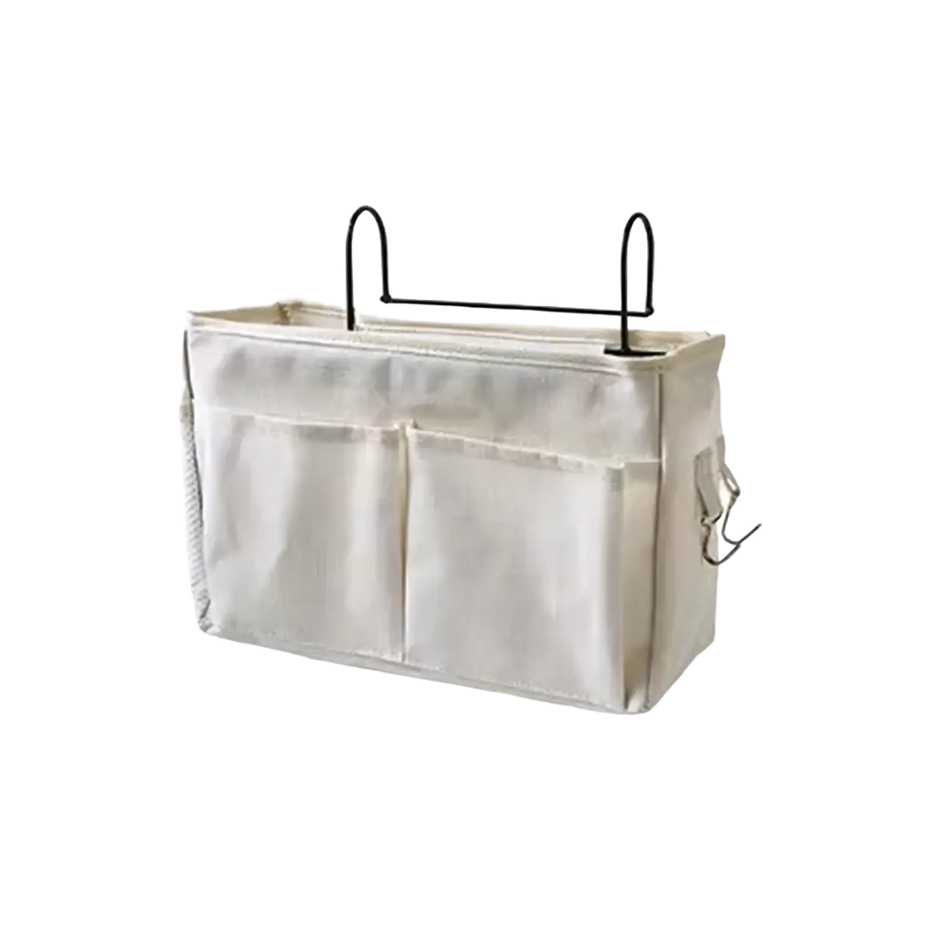 Beige linen bedside storage caddy hanging organizer with black metal hooks and side pockets for fabric overhead use