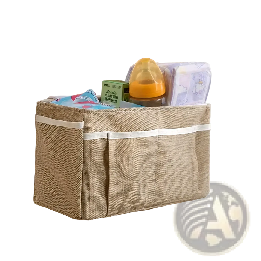 Beige woven fabric bedside storage caddy with white trim and multiple pockets for nursery organization