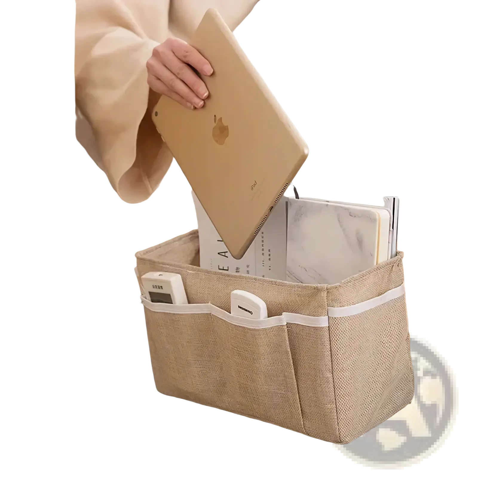 Beige woven fabric bedside storage caddy with white trim and multiple compartments for nursery organization
