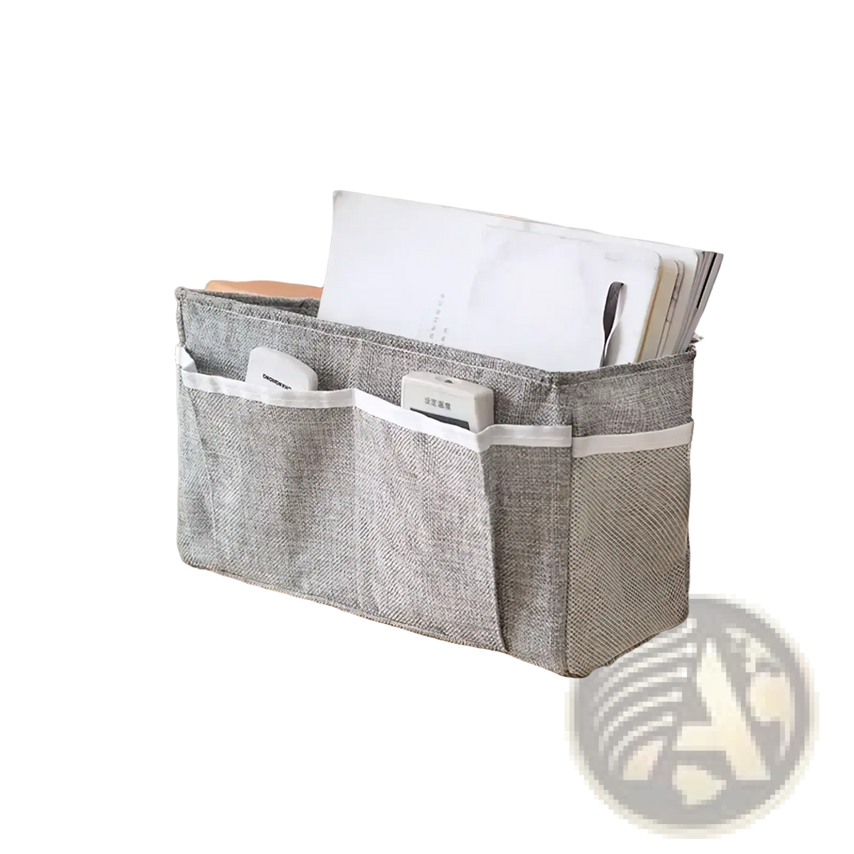 Gray textured fabric bedside storage caddy with white trim and multiple pockets for nursery organization