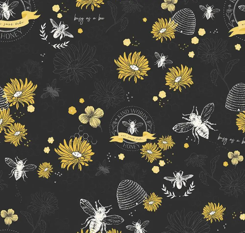 Black 1950s cotton blouse with yellow floral bee and white honeycomb pattern featuring a bow neck design