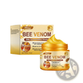 Golden jar of south moon bee venom skin regeneration cream with honeycomb design and cream spilling from the lid for face and neck