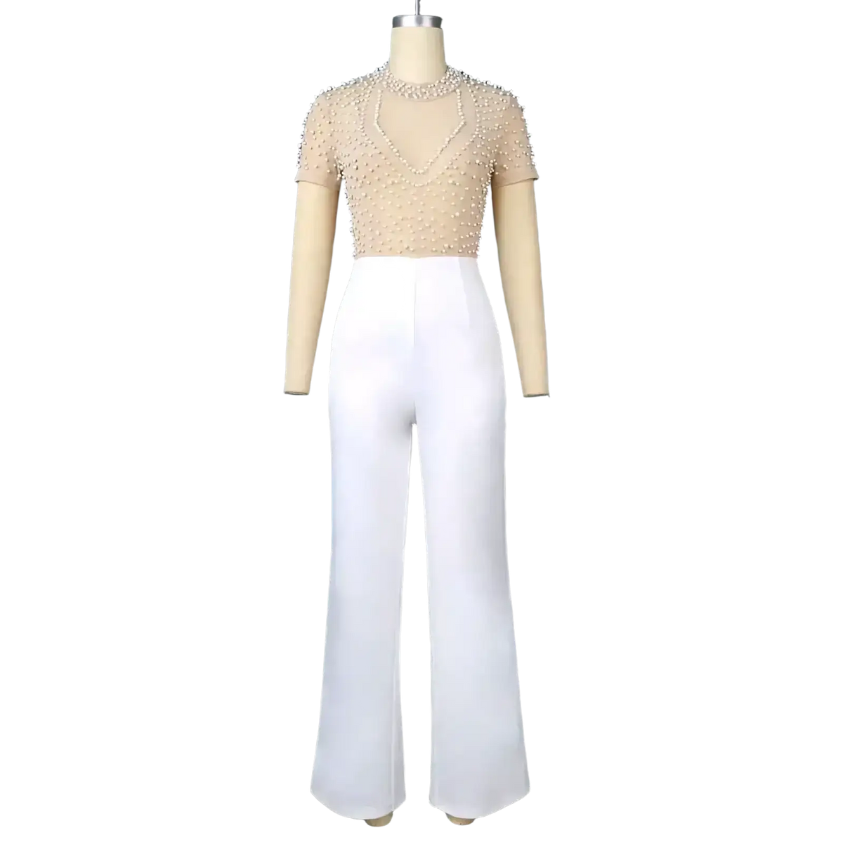Beige beaded mesh top paired with high waist white wide leg trousers in a beige beaded mesh party outfit