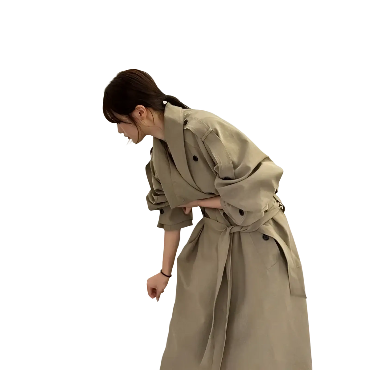 Beige belted trench coat for women with buttoned cuffs made from lightweight material for stylish outerwear