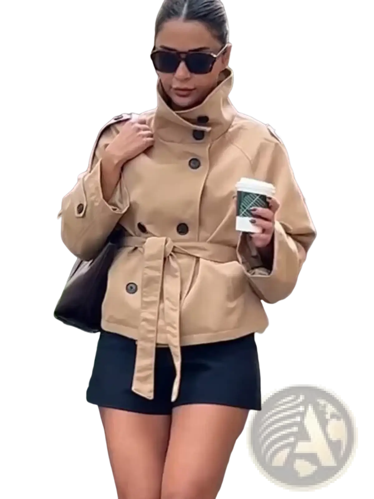 Beige double breasted trench coat in tan with a belted waist and dark buttons for a classic outerwear look