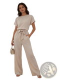 Beige linen jumpsuit with short sleeves and a tied waistband in a relaxed fit for comfortable wear
