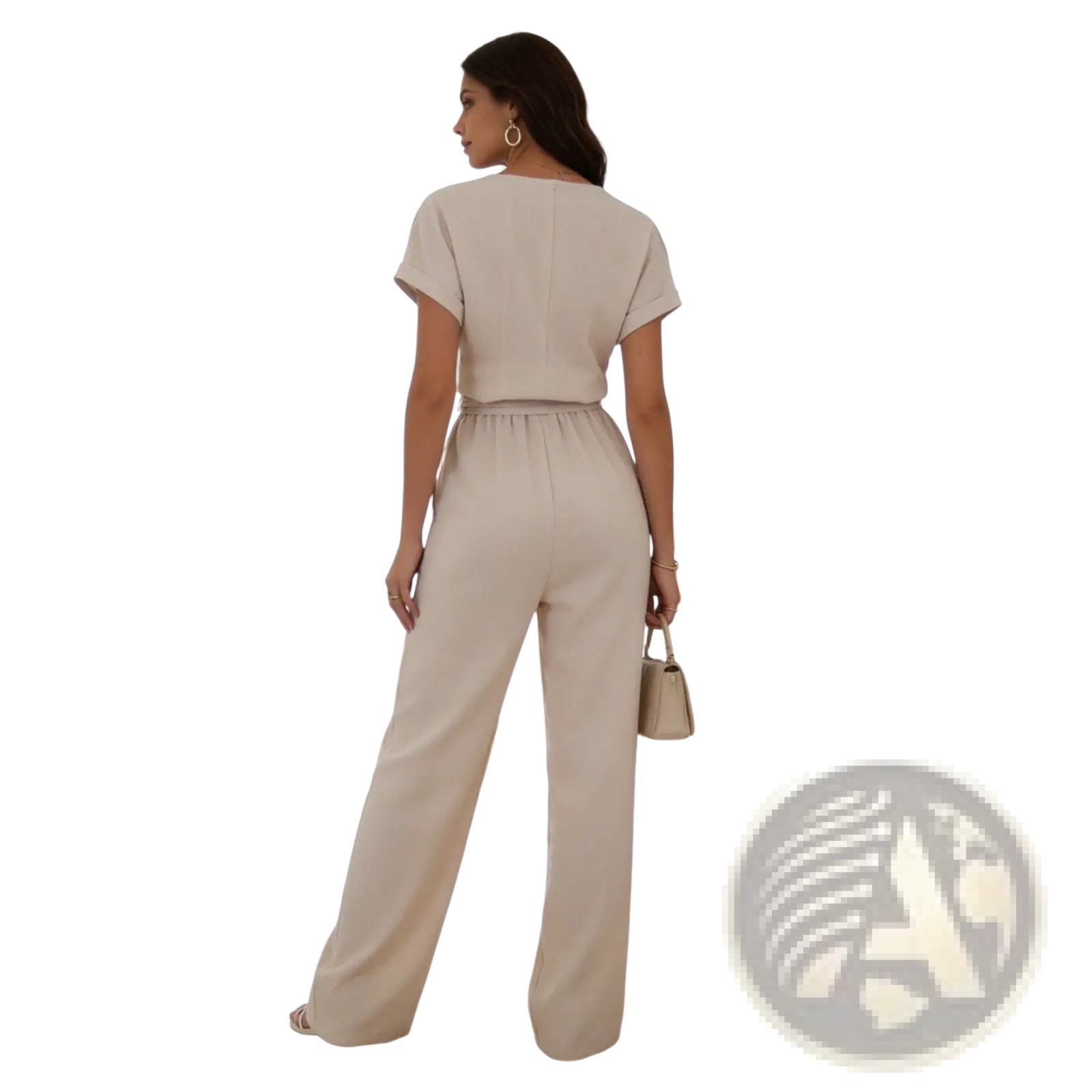Beige linen jumpsuit with relaxed fit short sleeves and elastic waistband for comfortable wear