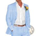 Light blue linen suit jacket with subtle texture worn open over white shirt with yellow floral boutonniere for beach wedding