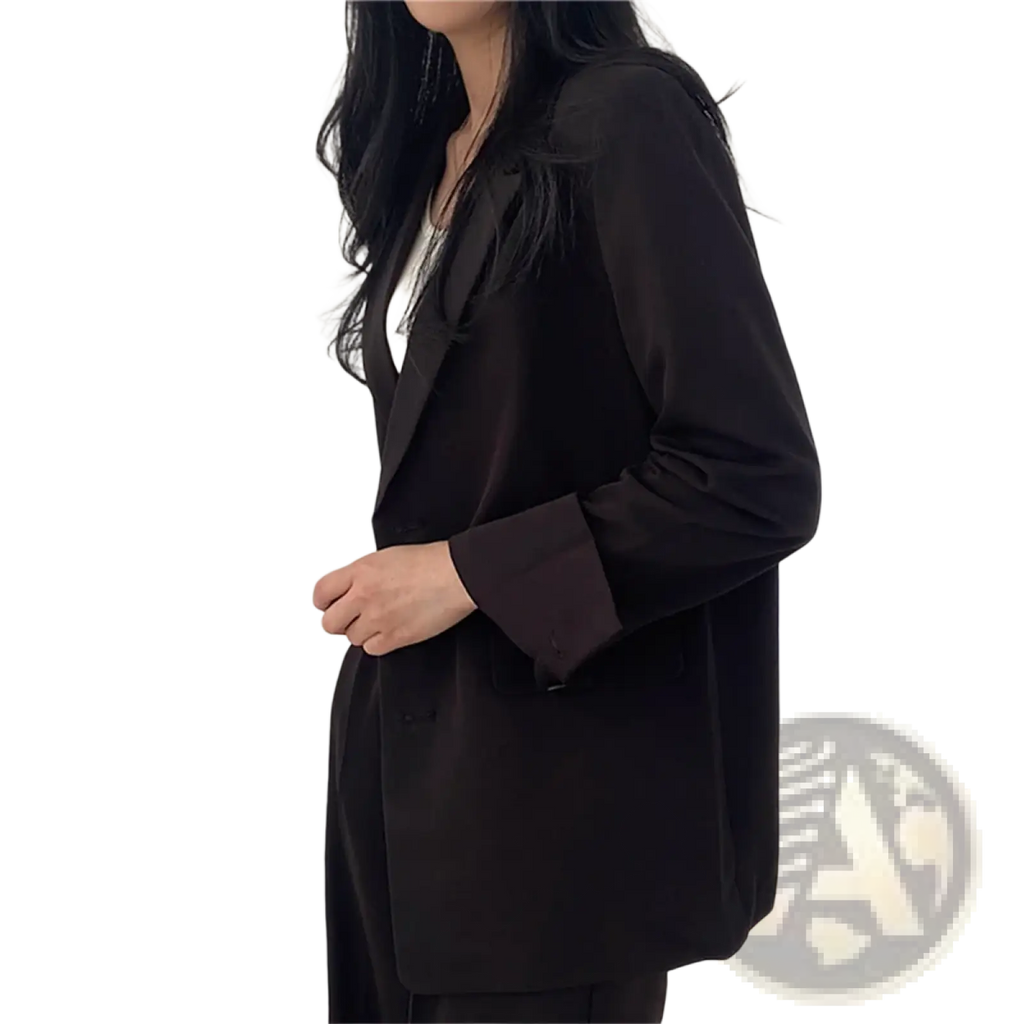 Black satin blazer with a sleek tailored fit and long sleeves shown as part of beige pant suit set wide leg blazer collection