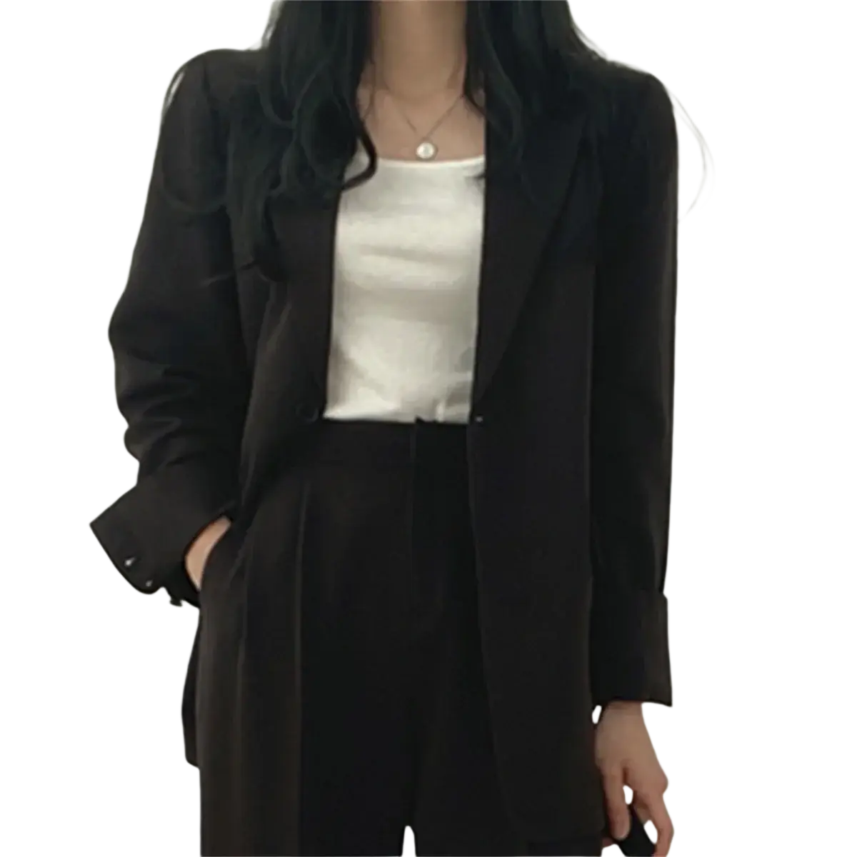 Black blazer with a sleek tailored fit and subtle sheen complementing the beige pant suit set with wide leg blazer