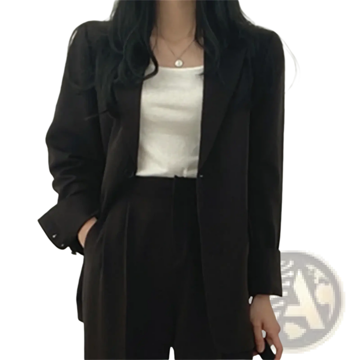 Black blazer with a sleek tailored fit and subtle sheen complementing the beige pant suit set with wide leg blazer