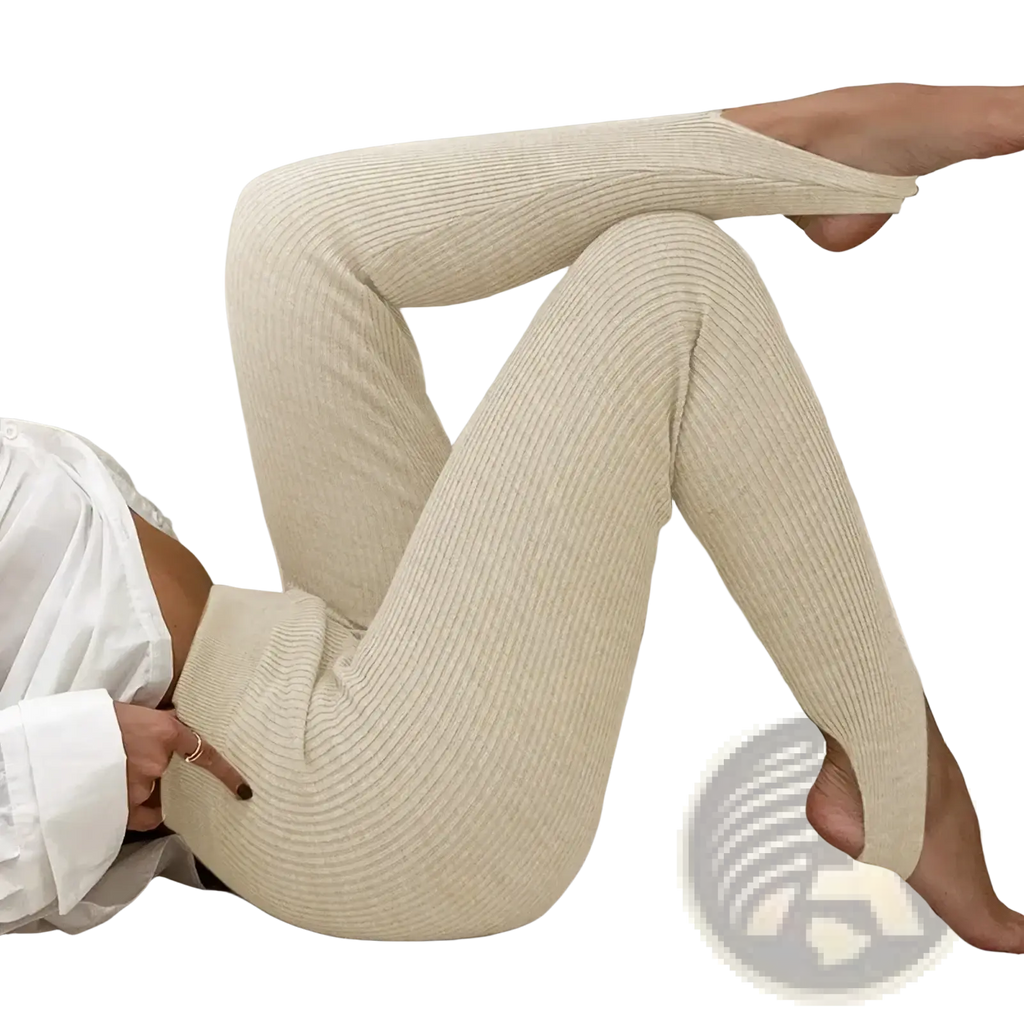 Beige ribbed knit high waist leggings in cream color with a sleek form-fitting design and open-toe ankle cutouts