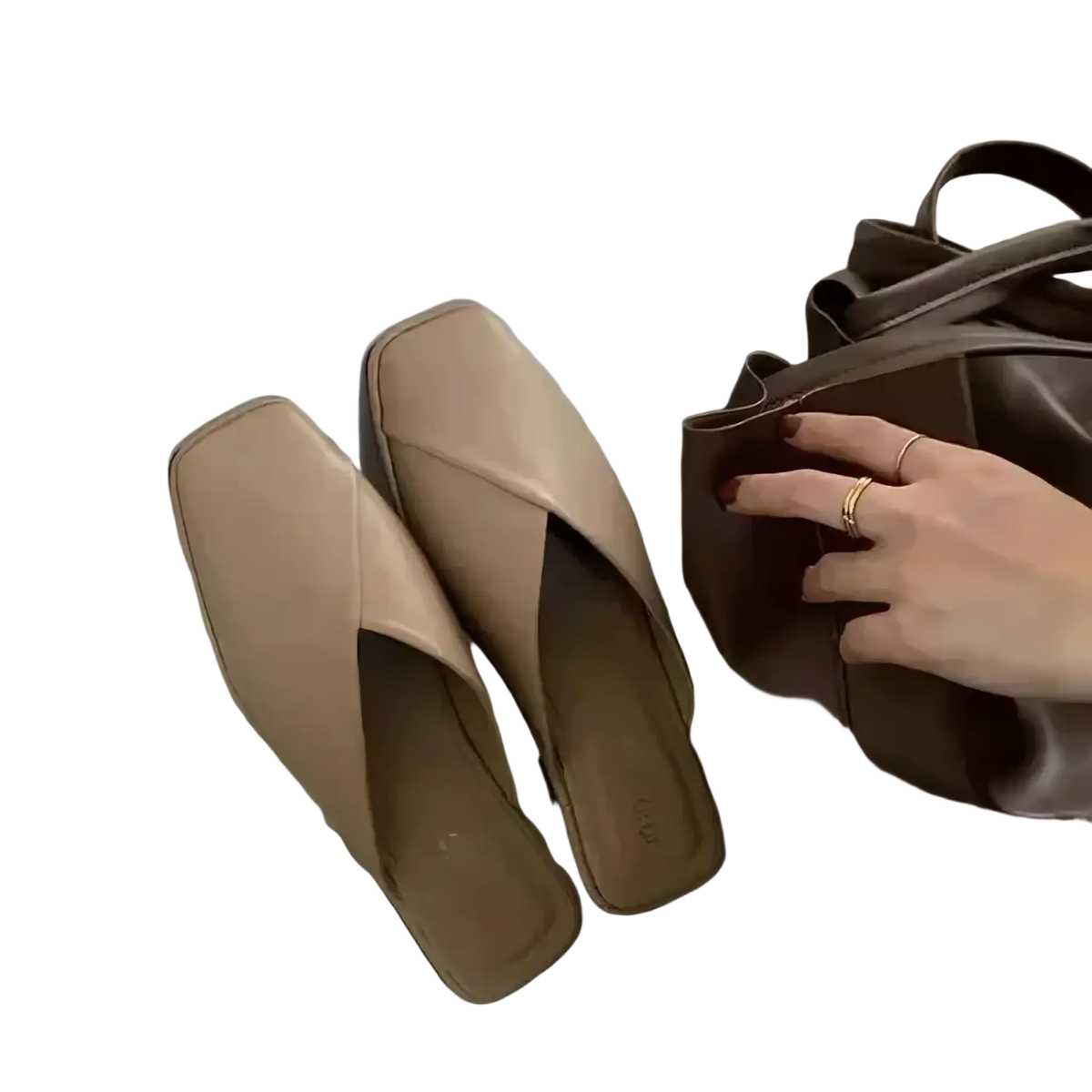 Beige square toe flat mules with a sleek minimalist design and soft leather finish