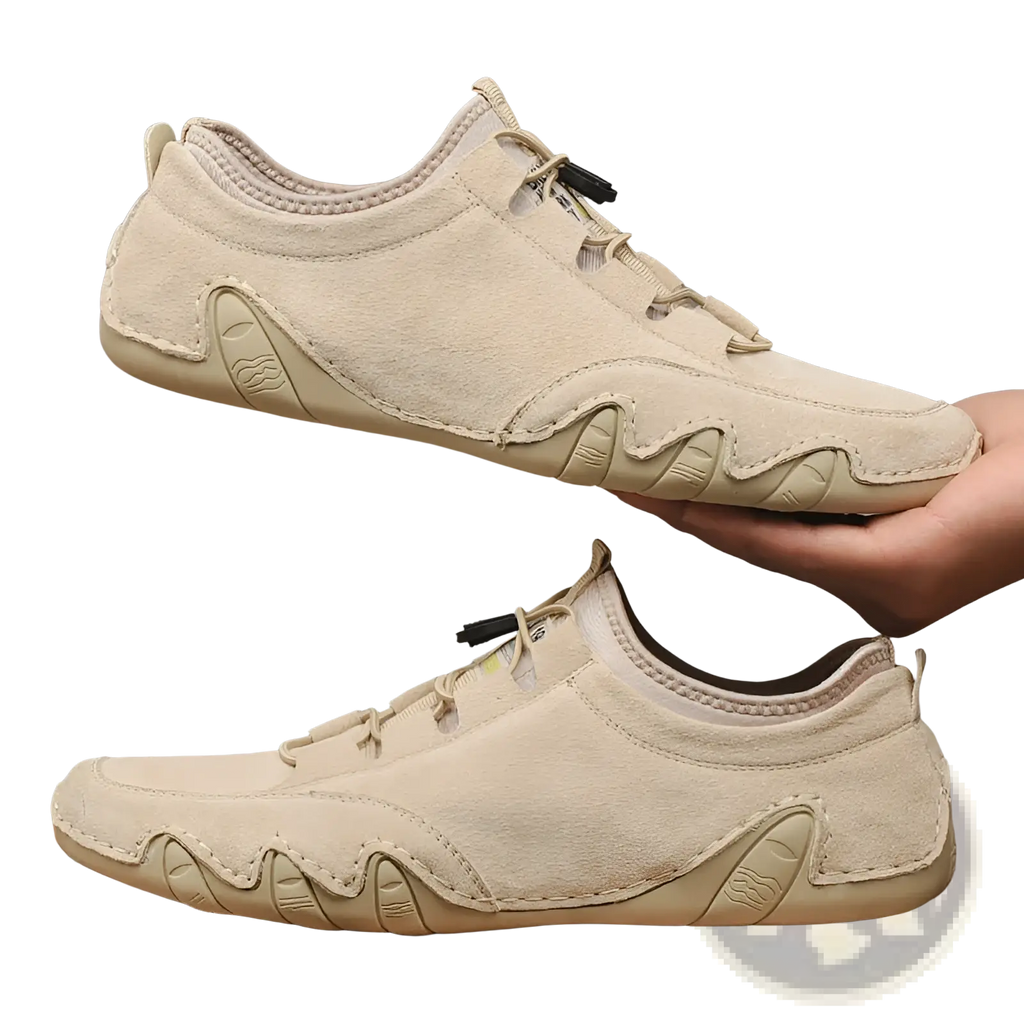 Beige suede leather men’s low top leisure shoes with wavy rubber sole design and black lace eyelets