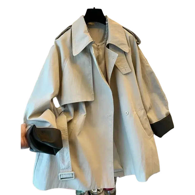 Beige trench coat with black contrast cuffs and shoulder accents featuring classic collar for autumn winter outerwear