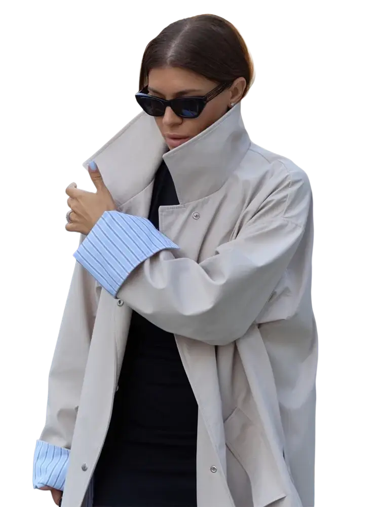 Beige trench coat with high collar and buttoned cuffs featuring elegant light blue striped inner lining
