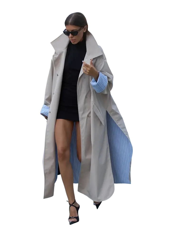 Beige trench coat with a high collar and side slit featuring light blue pinstriped lining for elegant outerwear
