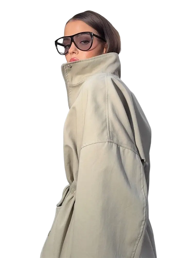 Beige utility trench coat with high collar and drawstring waist for adjustable fit and stylish outerwear use