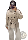 Beige wool belted short trench coat for women with double-breasted black buttons and a tailored waist design