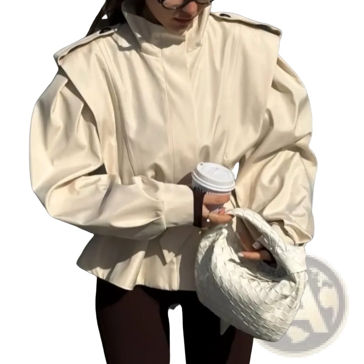 Cream-colored structured shoulder bag with woven texture and rounded handles complementing belted trench coat women autumn outerwear