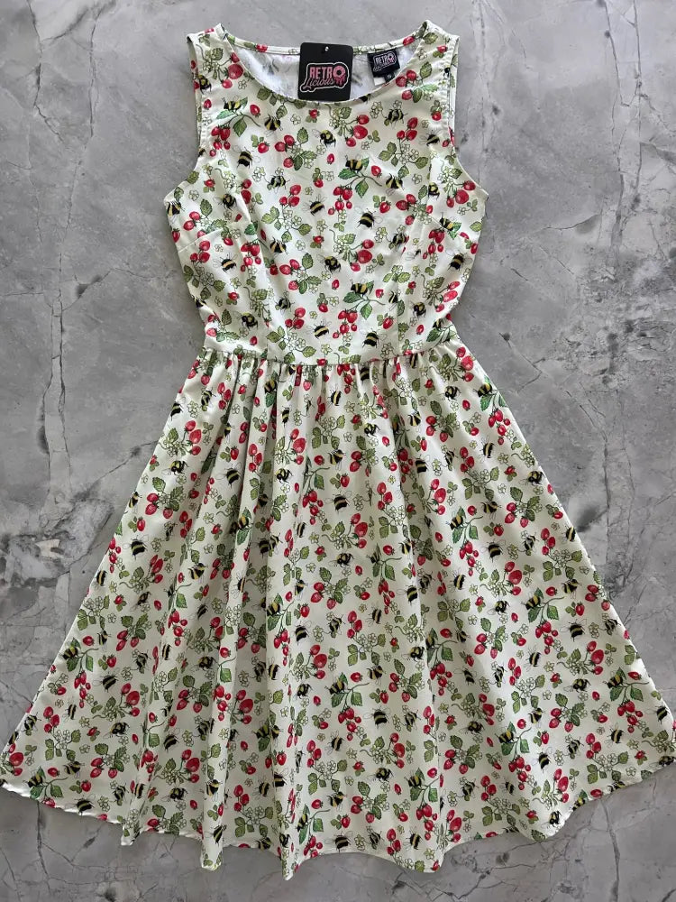 Berry bees 1950s vintage sleeveless cotton dress in cream with cherry and bee print and pockets