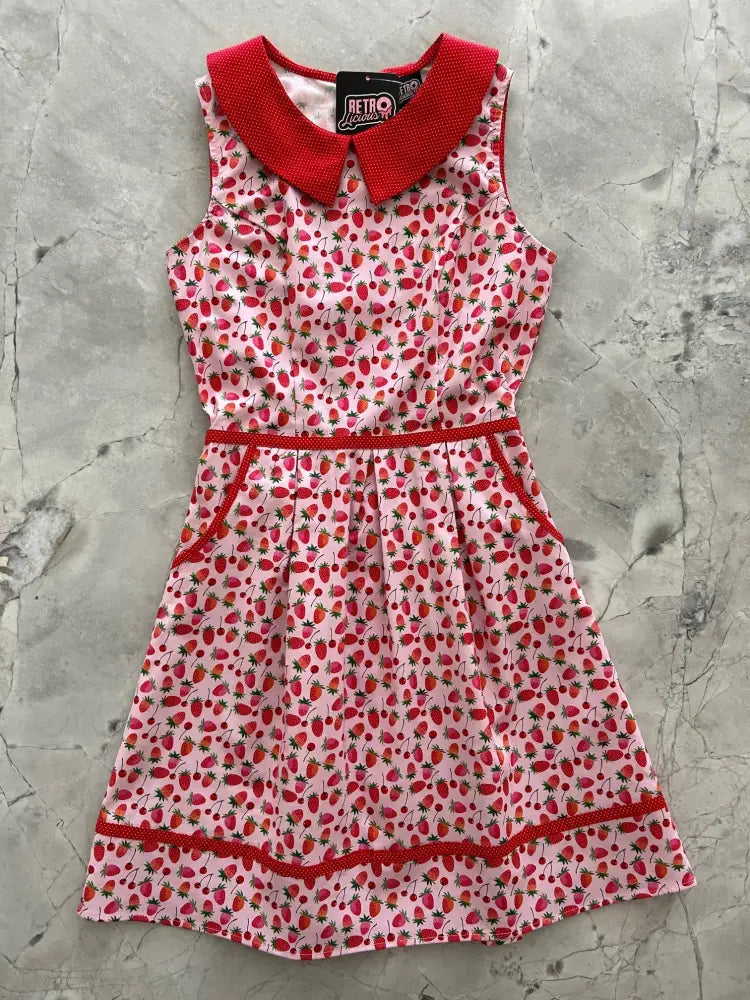 Berry Cherry retro polka dot cotton sleeveless dress in pink with strawberry print and red peter pan collar trim
