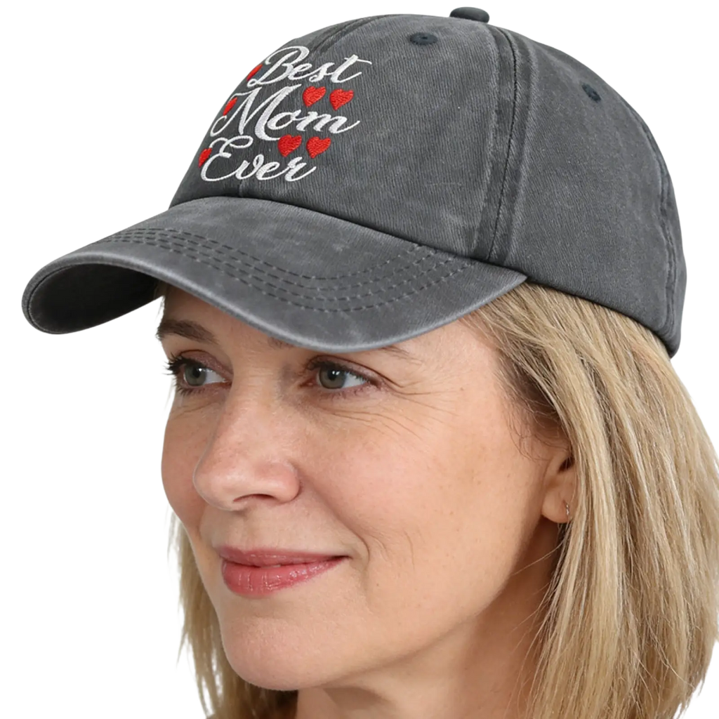 A faded gray distressed denim baseball cap with best mom ever embroidered in white script and red hearts
