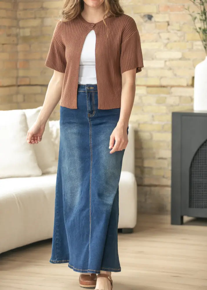 Brown ribbed knit short-sleeved cardigan with button closure paired with bethany dark wash a-line denim maxi skirt