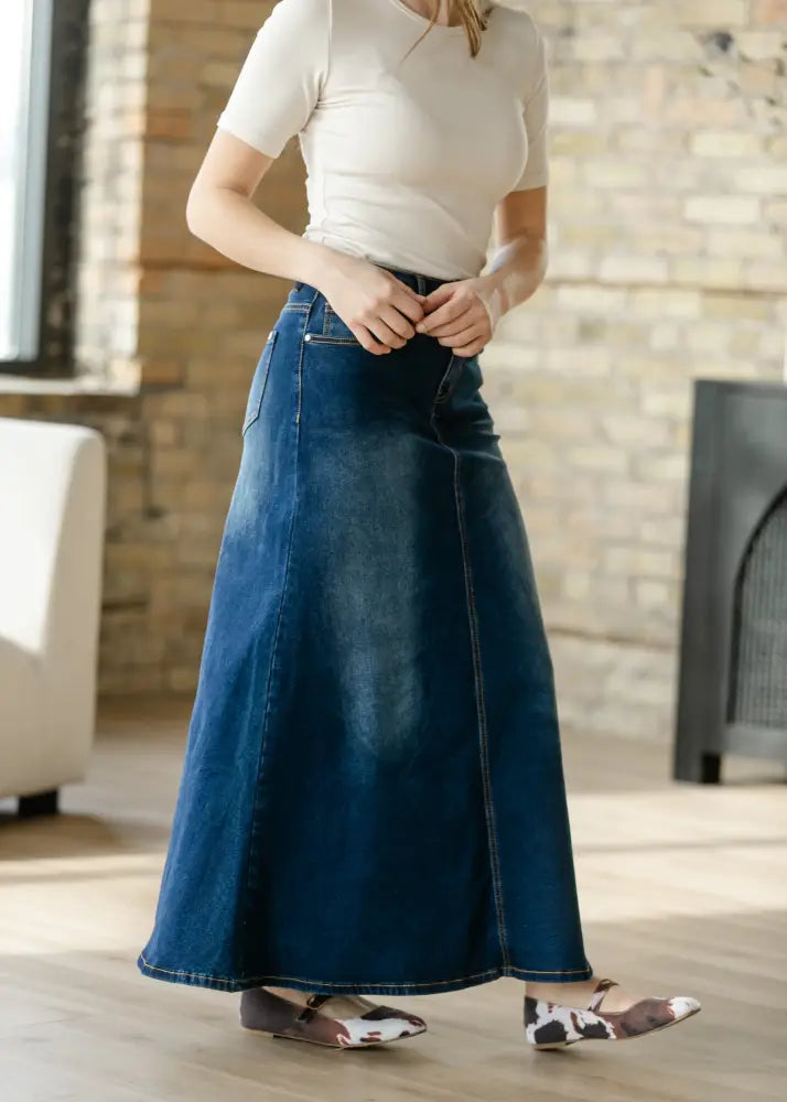 Bethany dark wash a line denim maxi skirt in deep blue with high waist and flared hem made from denim material
