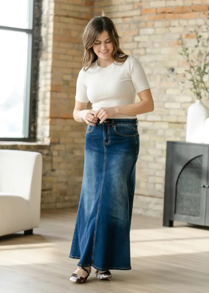 Bethany dark wash a-line denim maxi skirt in dark blue with straight cut and visible stitching details