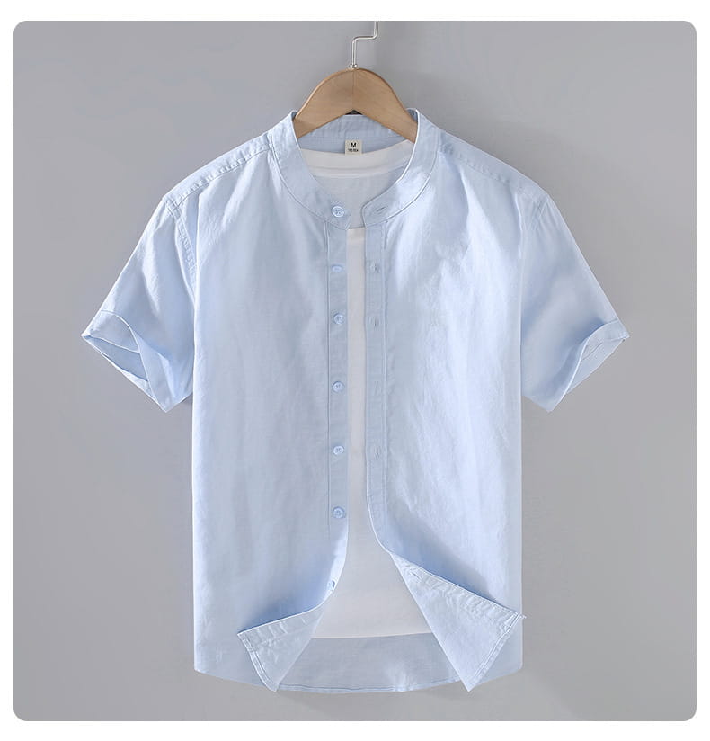 Light blue men linen short sleeve shirt with a mandarin collar and button-up front.