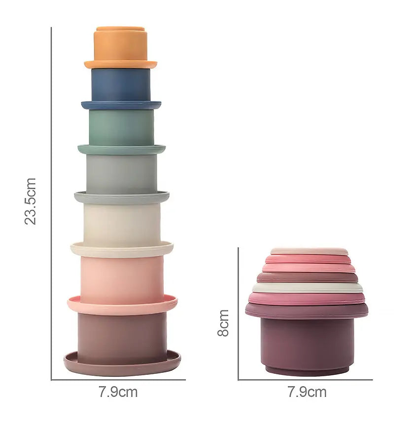 Stackable silicone nesting cups in pastel and earthy tones designed as an educational nesting baby toy.