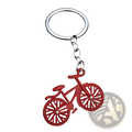 Red bicycle keychain charm set with silver metal ring and chain featuring small crystal accents on each wheel