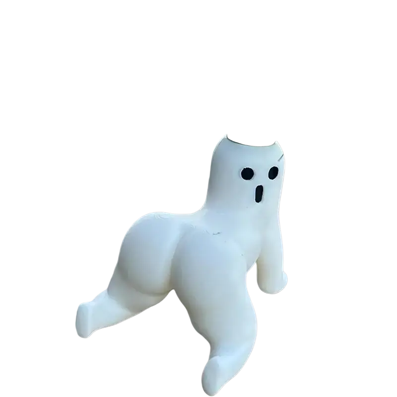 Big booty ghost planter made of white ceramic with black eyes holding a green air plant for indoor decor