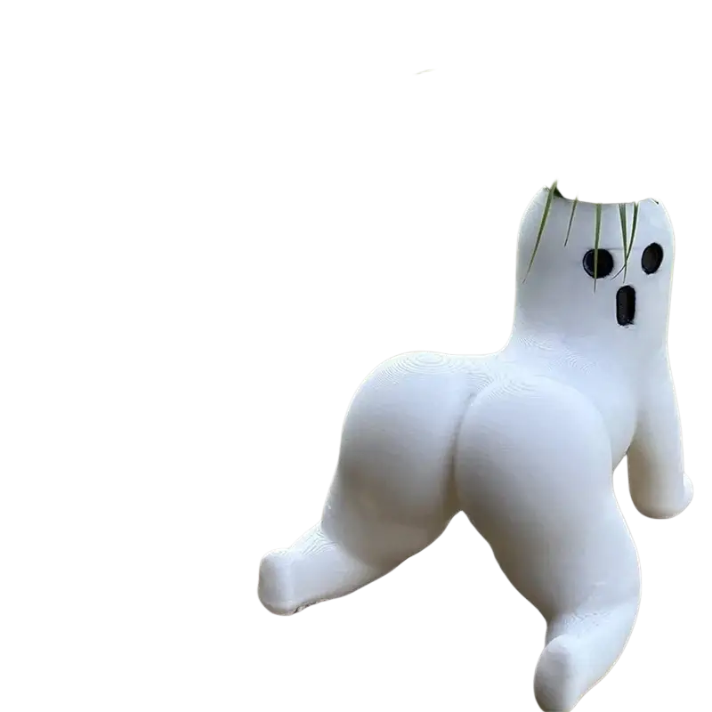 White resin booty ghost planter with black facial details holding green air plant big booty ghost planter