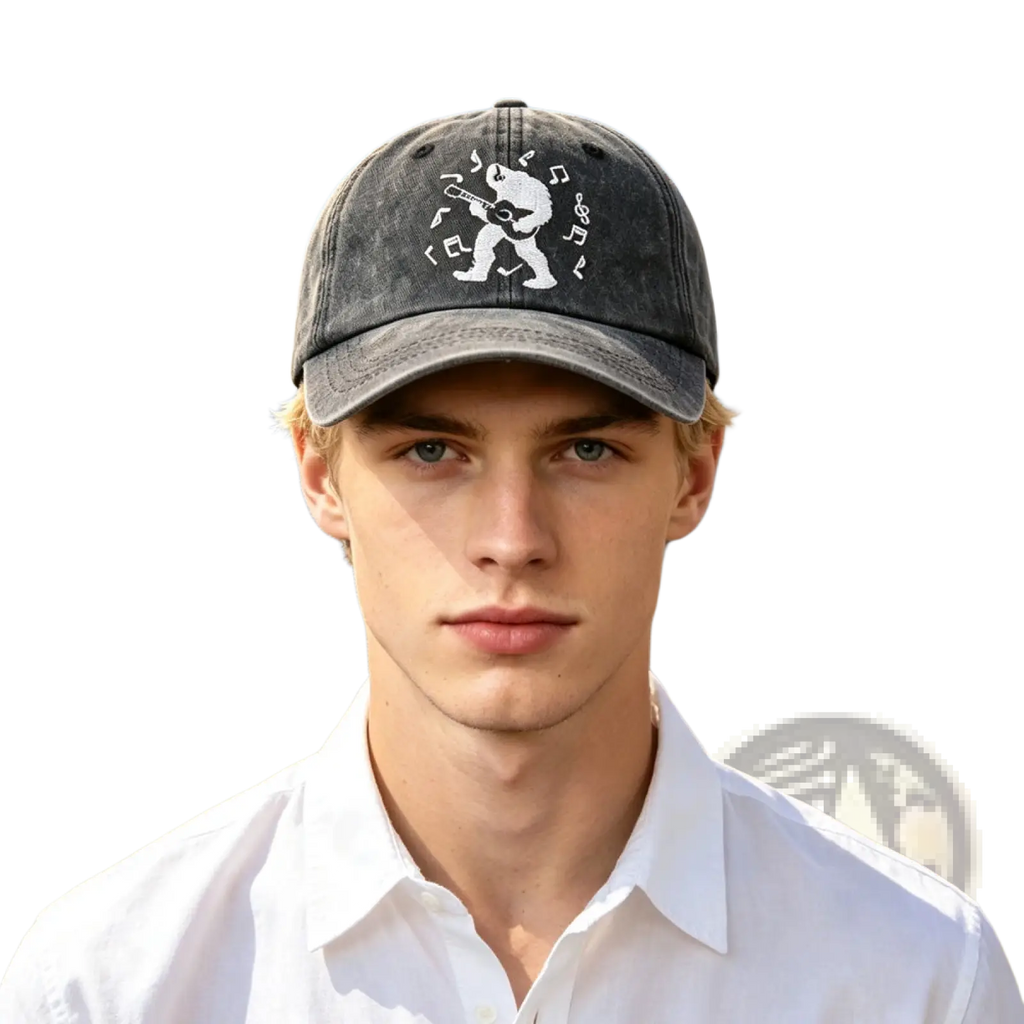 Dark gray distressed baseball cap with white embroidered bear playing guitar and musical notes vintage design