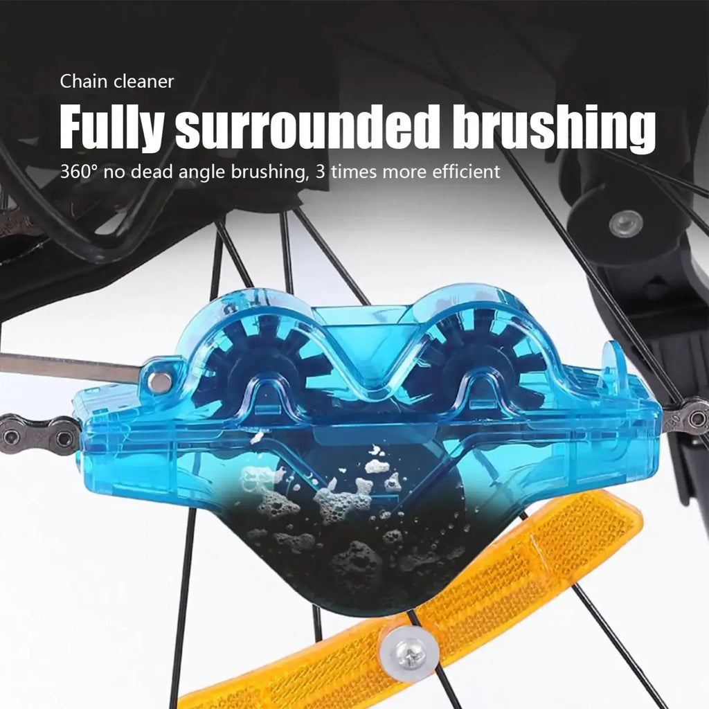 Transparent blue plastic bike chain cleaner kit with internal brush mechanism for portable scrubbing tool use