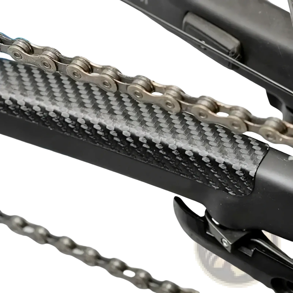 Bike chain protector pvc frame guard black on carbon fiber chainstay with textured weave and silver metallic bike chain