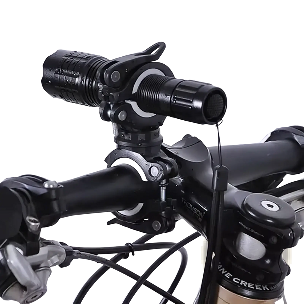 Black tactical bicycle handlebar mount with adjustable clamp and quick-release for flashlight attachment