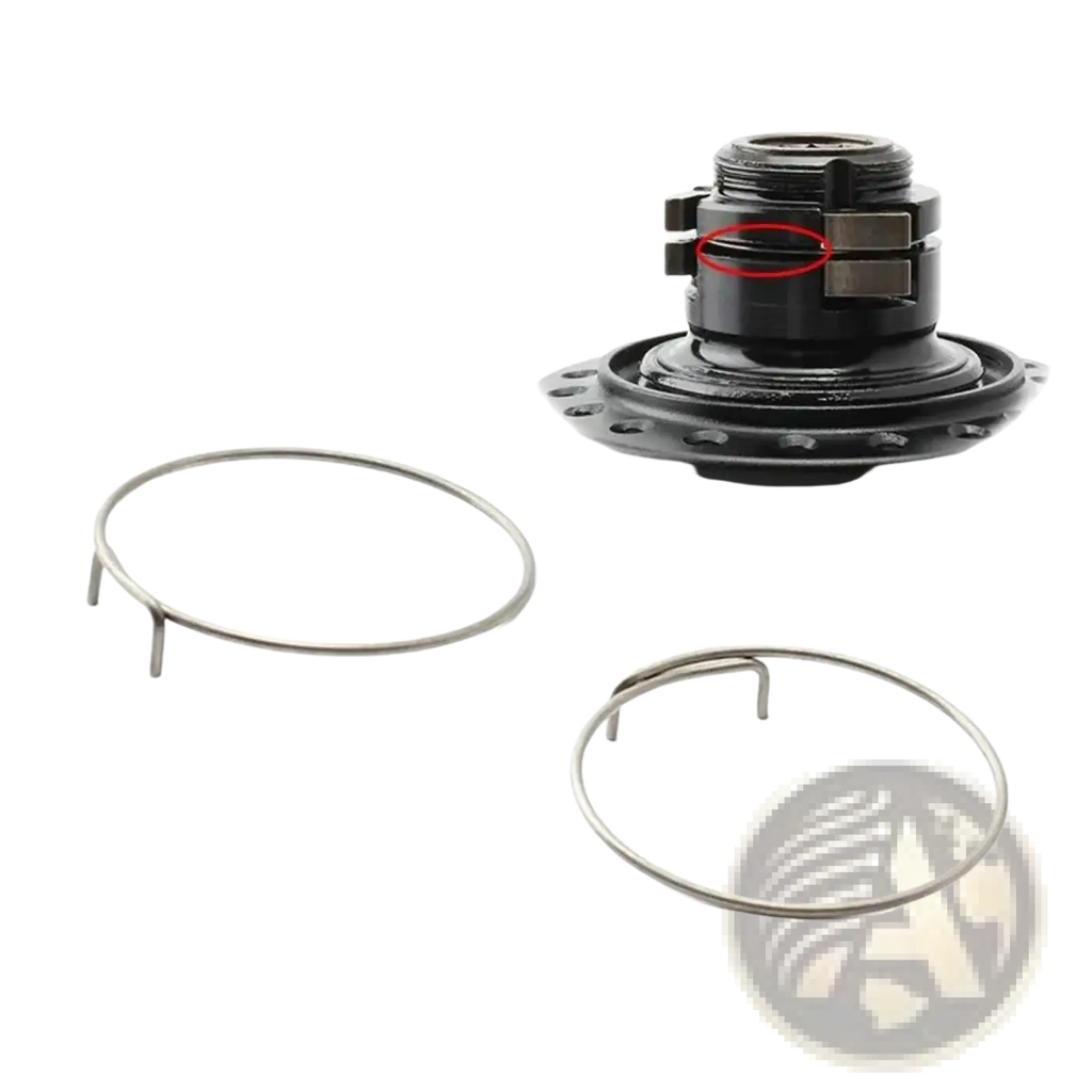Black bicycle hub spring pawl repair kit showing back side with two silver metal retaining rings for bike maintenance