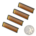 Set of four amber rectangular bike pedal reflectors with black plastic frames and textured surfaces for safety use