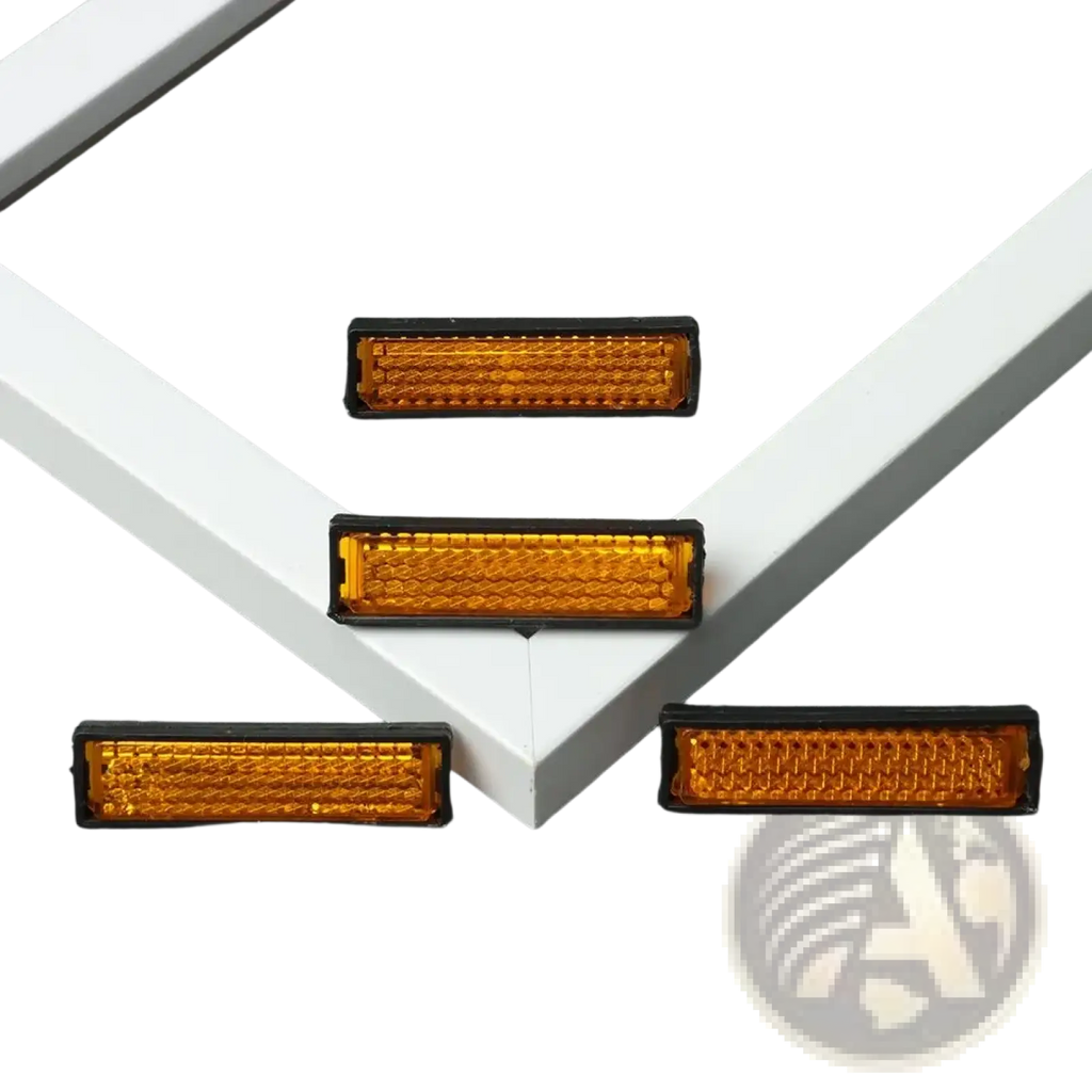 Bike pedal reflector set 4 pack amber safety featuring rectangular textured reflectors with black plastic frames for visibility