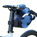 Black bike saddle bag stabilizer bracket with adjustable straps and sleek curved design shown from the back side