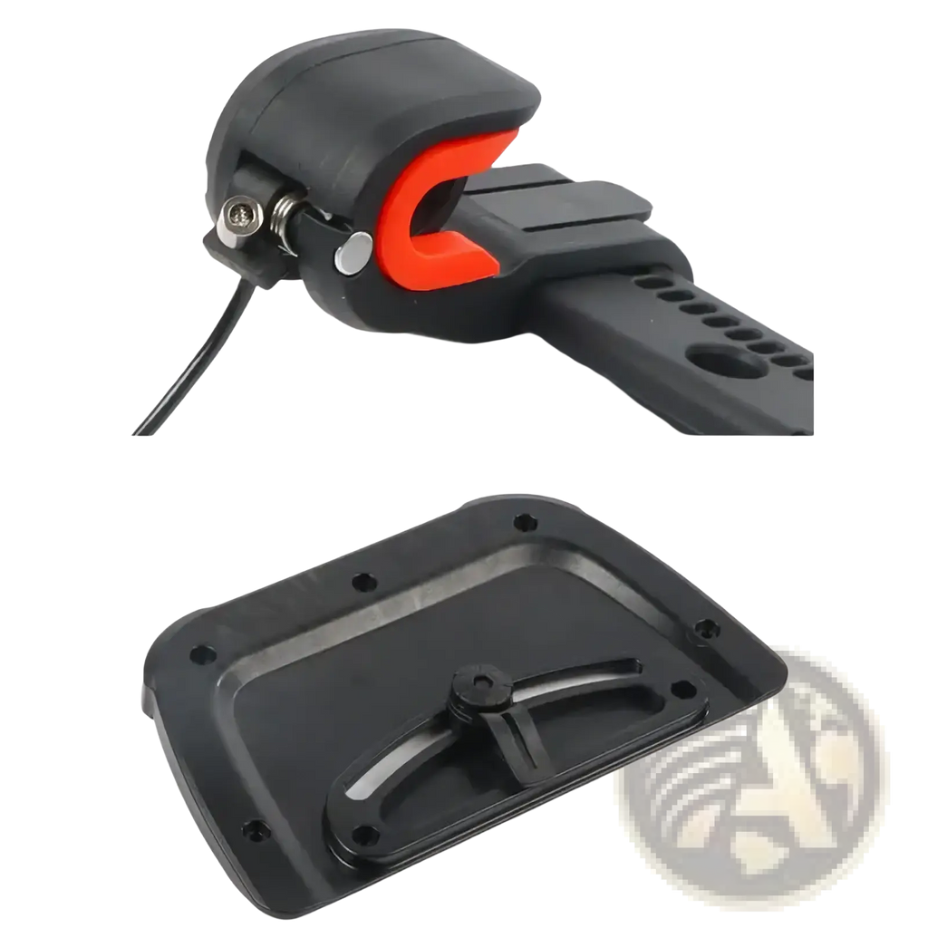 Black plastic bike bell with bright orange trigger mechanism attached to adjustable nylon rack clip buckle