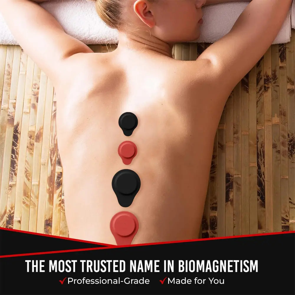 Black and red silicone neodymium biomagnetic therapy pads arranged vertically along the back for spine therapy