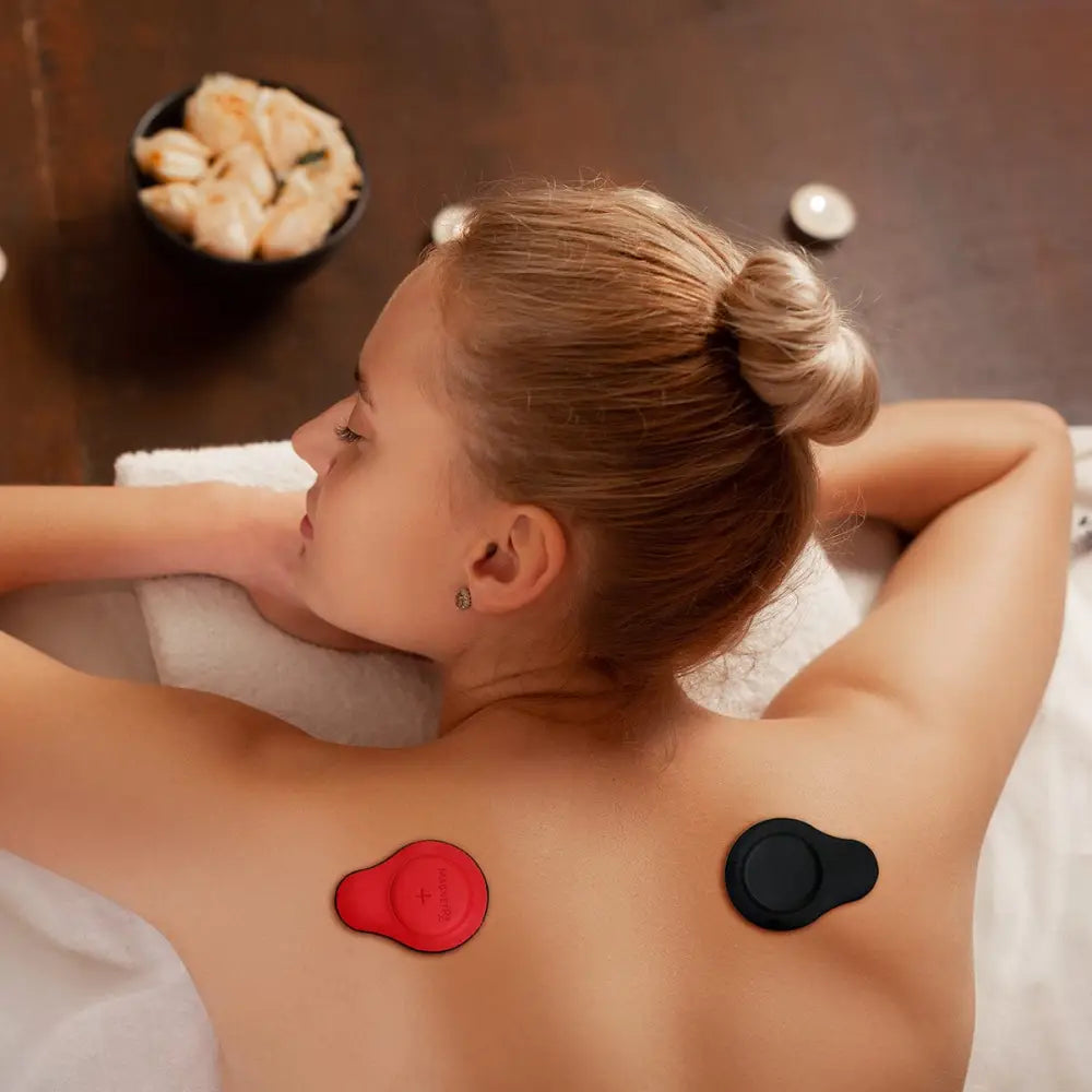 Red and black silicone-backed acupressure massage pads from magnetrx premium leather biomagnetic neodymium magnet set