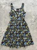 A sleeveless black cotton fit and flare midi dress with blue jay print and gathered waistline