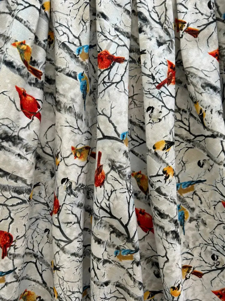 White vintage pleated cotton skirt with pockets featuring colorful birds on black birch tree branches pattern