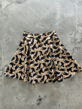 Vintage bird print cotton skater skirt with flared design black bird pattern on cream and gold lightweight fabric