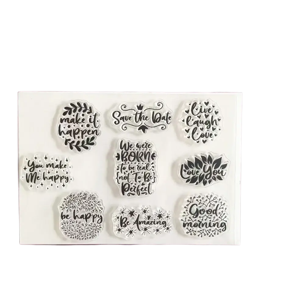Set of nine clear acrylic birthday stamps with black inked inspirational phrases and floral designs for crafting